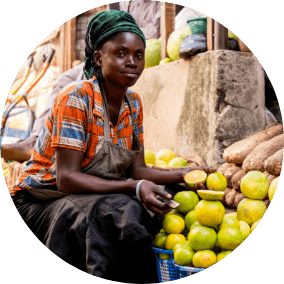 African woman at a fruit stand