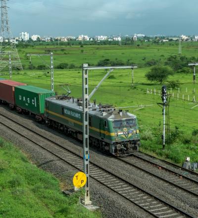 reight train hauled by a WAG9 electric locomotive at Vadgaon near Pune India.